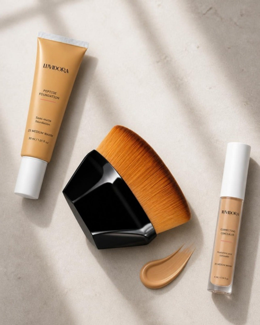Compact foundation brush with peptide foundation and concealer