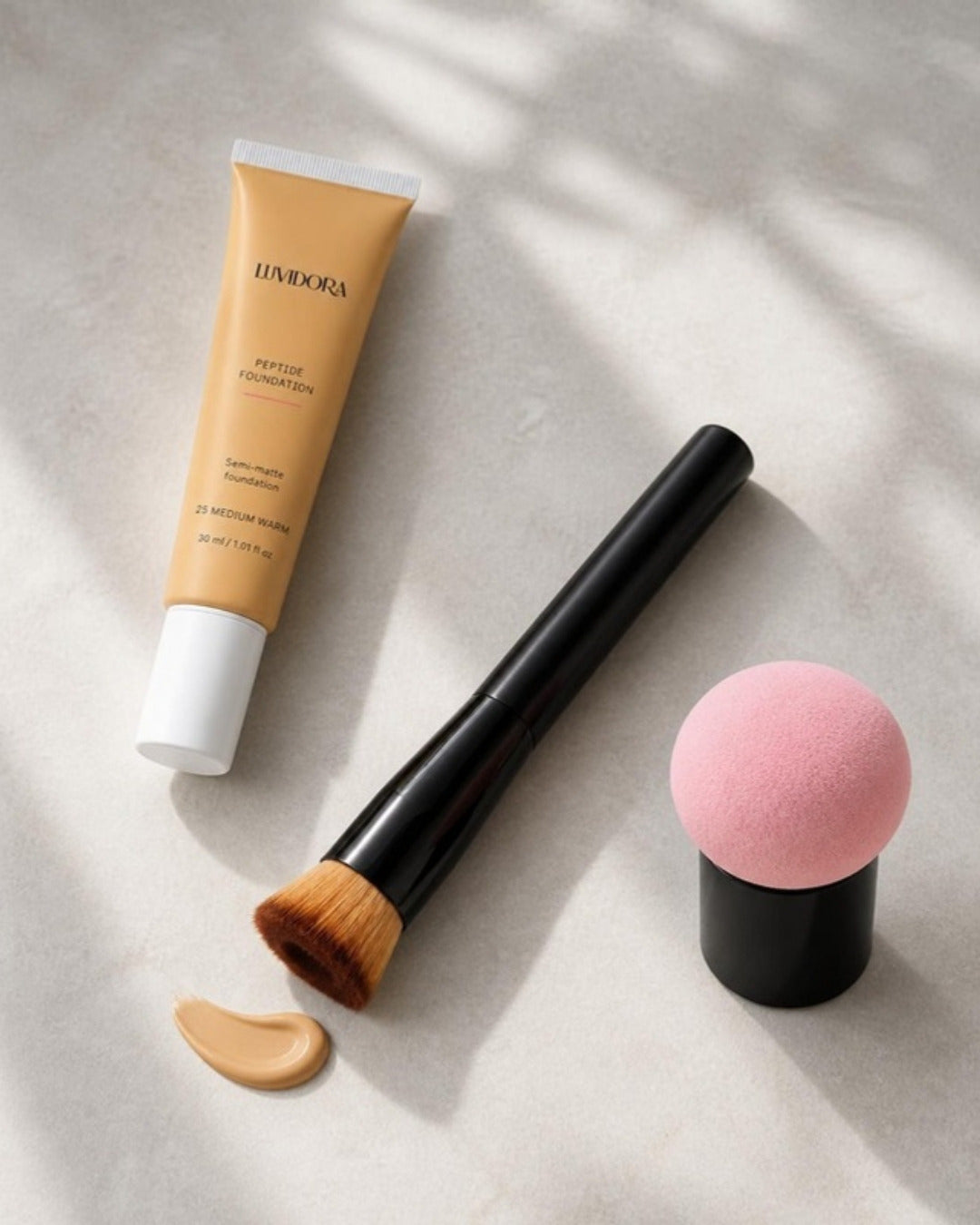 Precision foundation brush with peptide foundation and mushroom sponge