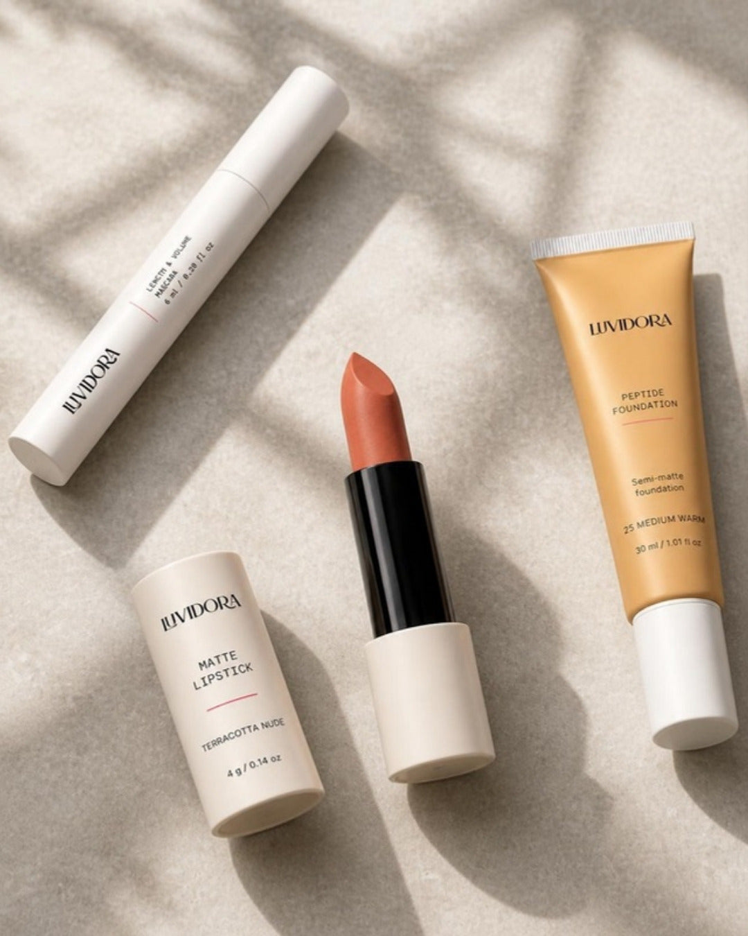 Luvidora terracotta nude lipstick with mascara and peptide foundation